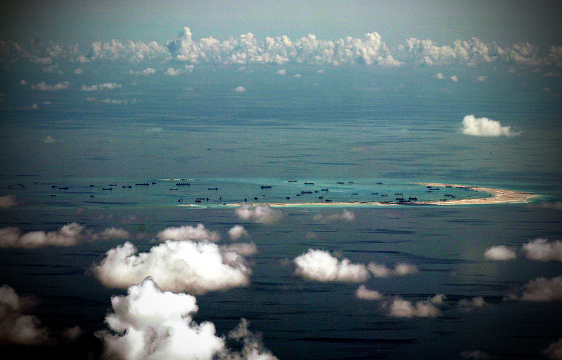 Illustration for article titled China Lands Plane On Growing Man-Made Island Airbase In South China Sea; Now What?